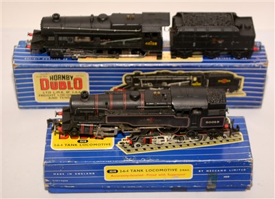 Lot 1397 - Hornby Dublo locomotives and tender.