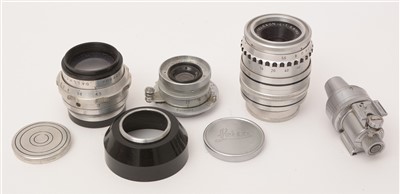 Lot 1434 - Three lenses, various; and a viewfinder.