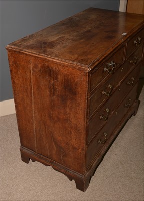 Lot 1213 - A George III burr walnut chest of drawers