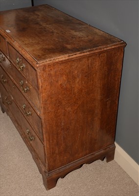 Lot 1213 - A George III burr walnut chest of drawers