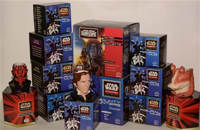 Lot 1225 - Star Wars mugs and two statuettes.