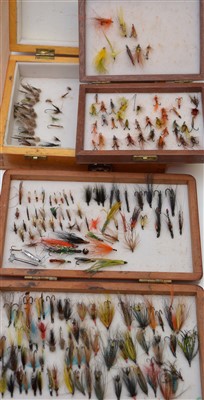 Lot 1601 - A collection of three wooden fly boxes and contents.
