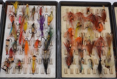 Lot 1602 - Two black plastic Fox Box fly cases containing salmon and sea trout flies.