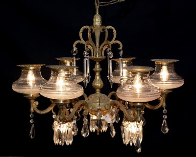 Lot 1021 - An ornate giltmetal and cut glass six light chandelier