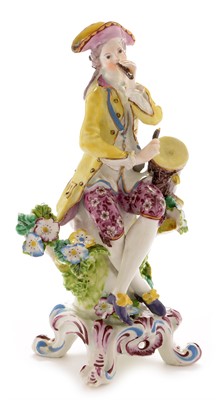 Lot 445 - Bow figure of a musician