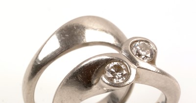 Lot 122 - Platinum and diamond wedding and engagement rings