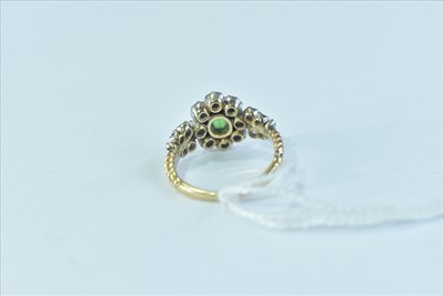 Lot 105 - Tsavoriate garnet and diamond ring