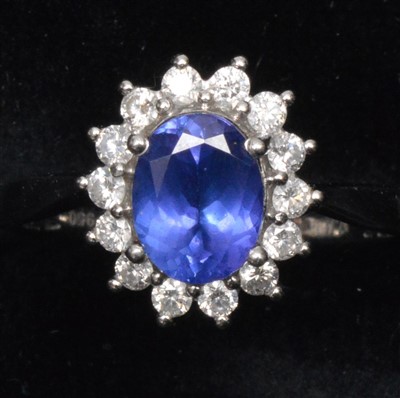 Lot 89 - Tanzanite and diamond cluster ring