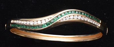 Lot 127 - Emerald and diamond bangle