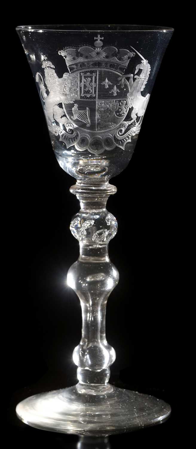 Lot 616 - Newcastle Royal Coat of Arms wine glass.