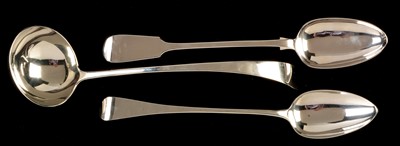 Lot 299 - Two silver gravy spoons and a ladle