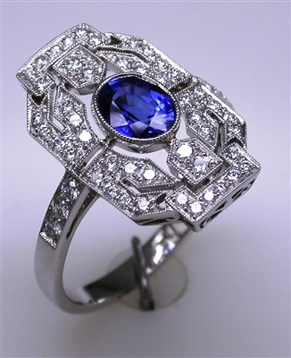 Lot 182 - Sapphire and diamond dress ring