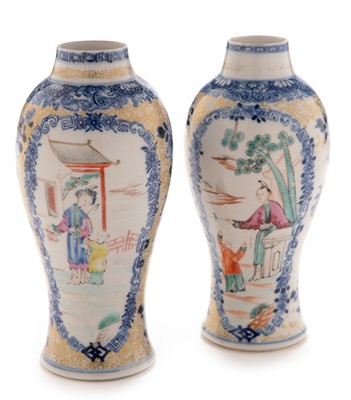Lot 460 - A near pair of Chinese 'soft paste' Famille Rose baluster vases.