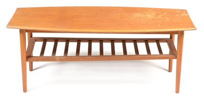 Lot 1165 - A mid 20th Century teak and beech coffee table.