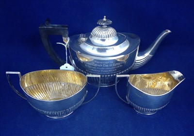 Lot 423 - Three piece silver tea service