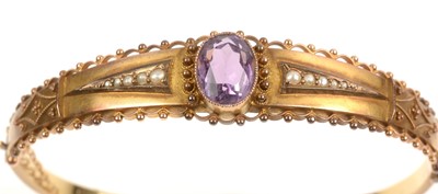 Lot 210 - Edwardian amethyst and pearl bangle