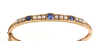 Lot 194 - Half pearl and GDT bangle