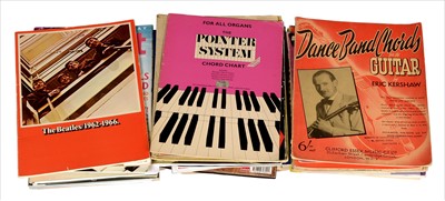 Lot 91 - Three boxes of guitar related books and music