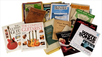 Lot 91 - Three boxes of guitar related books and music