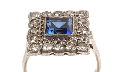 Lot 9 - A sapphire and diamond cluster ring