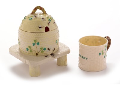Lot 464 - Belleek honey pot and mug