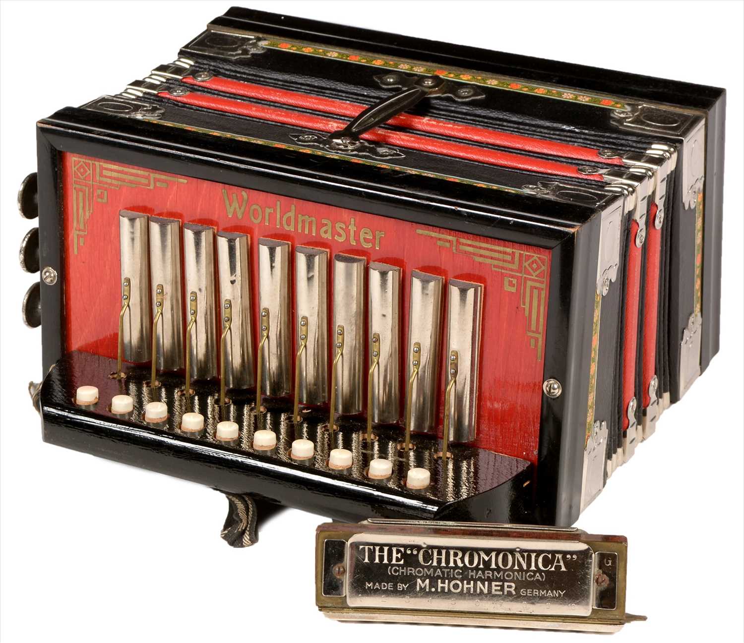 Lot 4 - Melodion and Hohner harmonica.