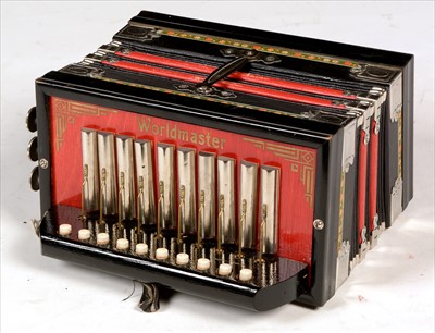 Lot 4 - Melodion and Hohner harmonica.