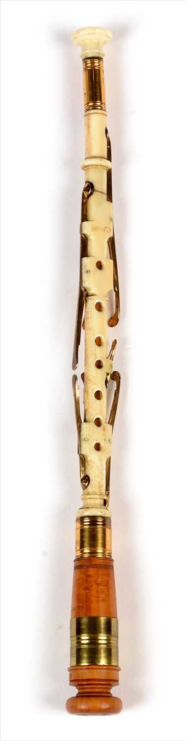 Lot 175 - A walrus ivory chanter.