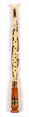 Lot 175 - A walrus ivory chanter.