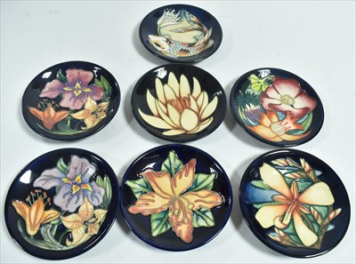 Lot 585 - Seven Moorcroft coasters