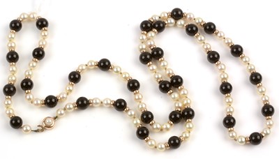 Lot 162 - Onyx and cultured pearl necklace