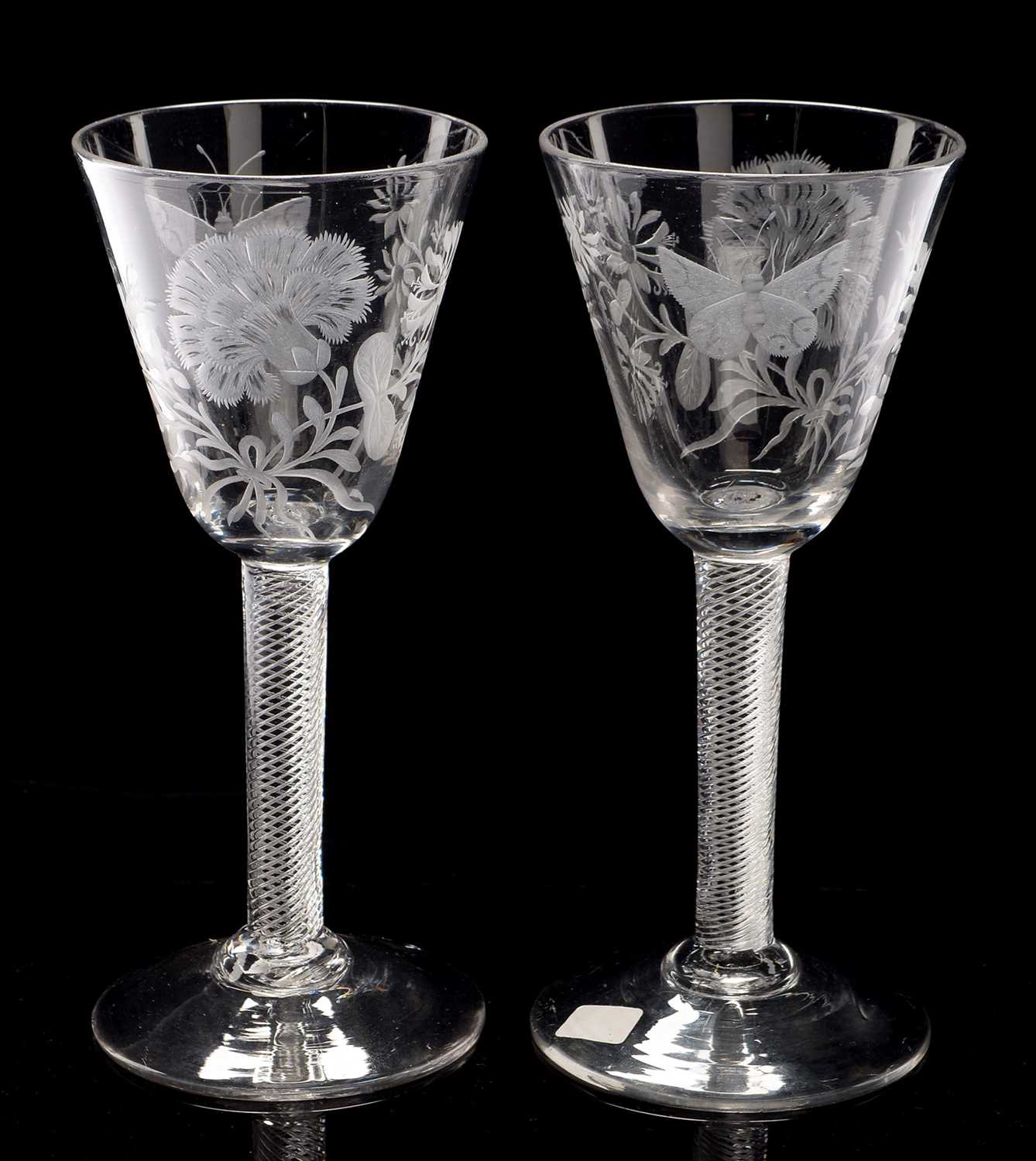 Lot 510 - Pair of engraved airtwist wine glasses