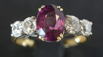 Lot 129 - Ruby and diamond ring