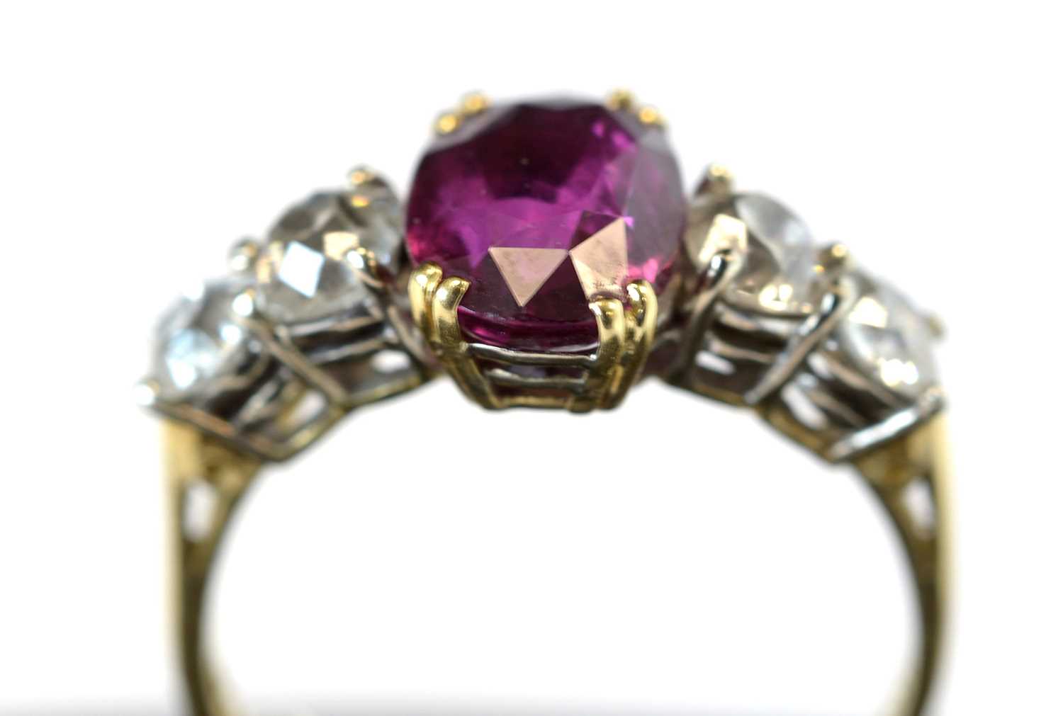 Lot 129 - Ruby and diamond ring