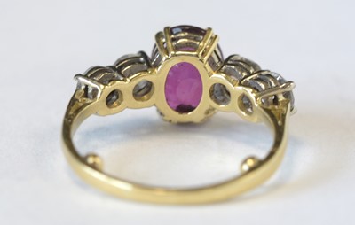 Lot 129 - Ruby and diamond ring
