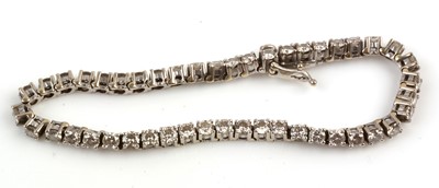 Lot 58 - Diamond tennis bracelet