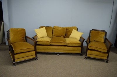 Lot 62 - Early/mid 20th C walnut Bergere three-piece suite.