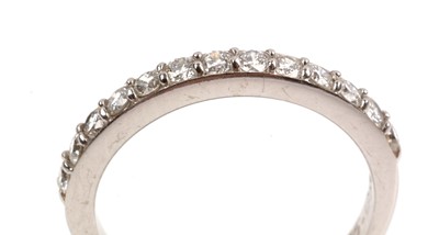 Lot 79 - Diamond half hoop eternity ring