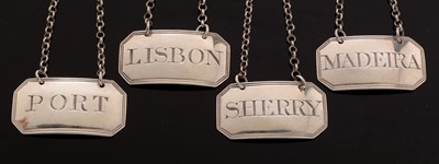 Lot 360 - Four silver decanter labels