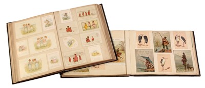 Lot 551 - Two albums of Victorian postcards.