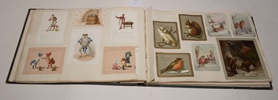 Lot 551 - Two albums of Victorian postcards.