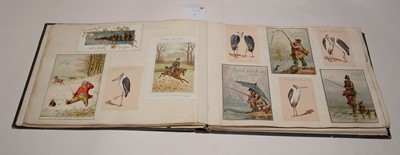 Lot 551 - Two albums of Victorian postcards.