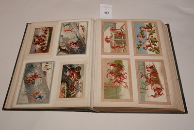 Lot 551 - Two albums of Victorian postcards.