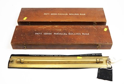 Lot 769 - Three rolling rulers.