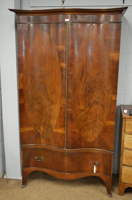 Lot 467 - Early 20th Century serpentine wardrobe
