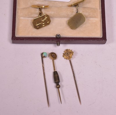 Lot 31 - Gold cufflinks and three tie pins