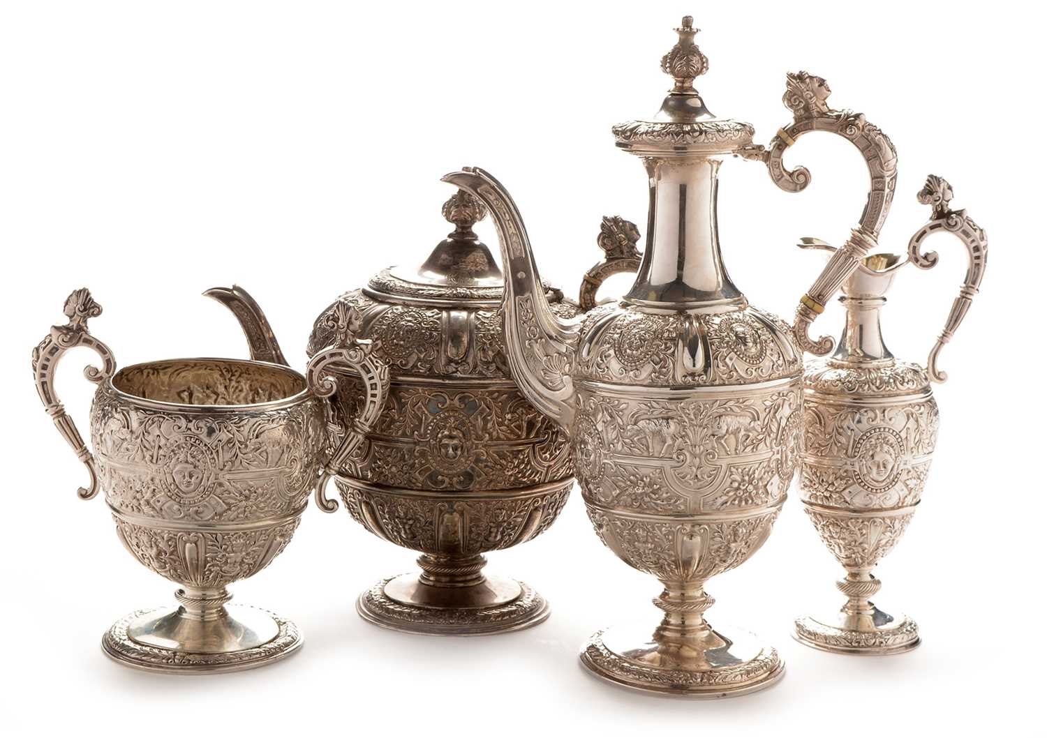 Lot 243 - Victorian silver Cellini pattern four piece tea service