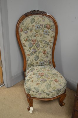 Lot 642 - A Victorian carved walnut high back nursing...
