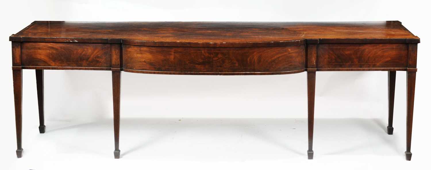 Lot 879 - George III mahogany breakfront serving table