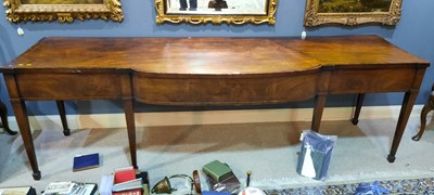 Lot 879 - George III mahogany breakfront serving table